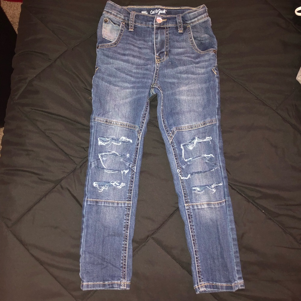 Destroyed denim jeans